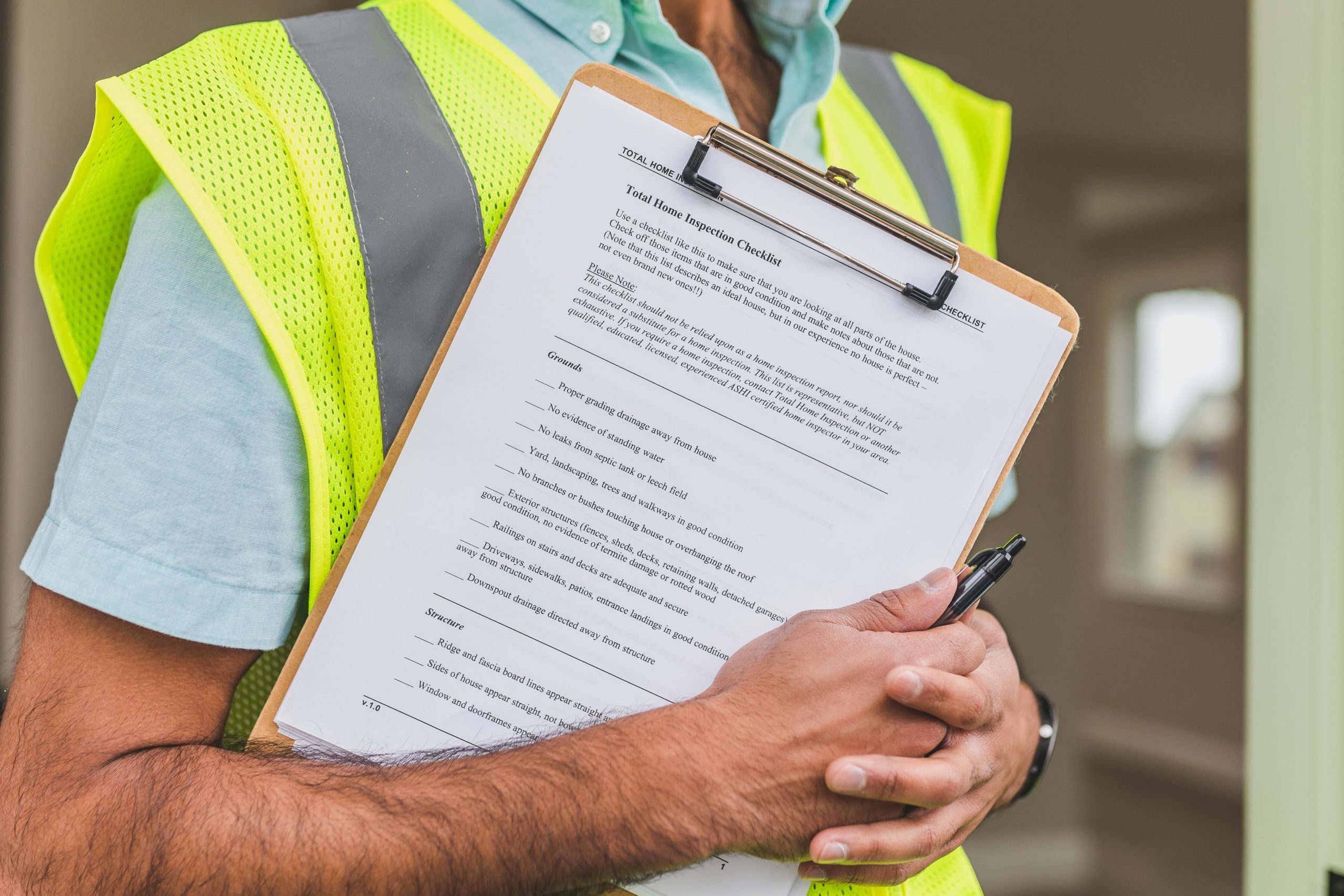 Electrician carrying out a home electrical safety inspection